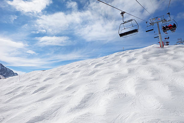 istock Overhead cable car - ski resort in Alps Mountains 184998735