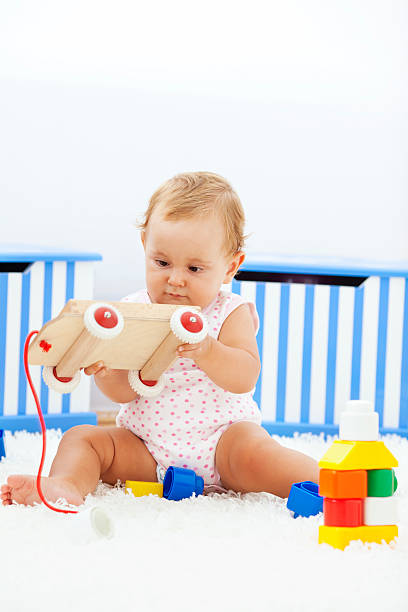 istock Baby girl having fun at home 184998822