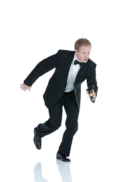 istock Man running with a handgun 184999270