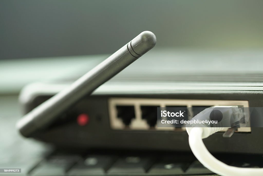 internet connection with wlan router in home office wlan antenna Router Stock Photo