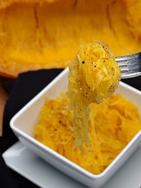 istock A bowl of spaghetti squash with shaved squash skin in back 184999423