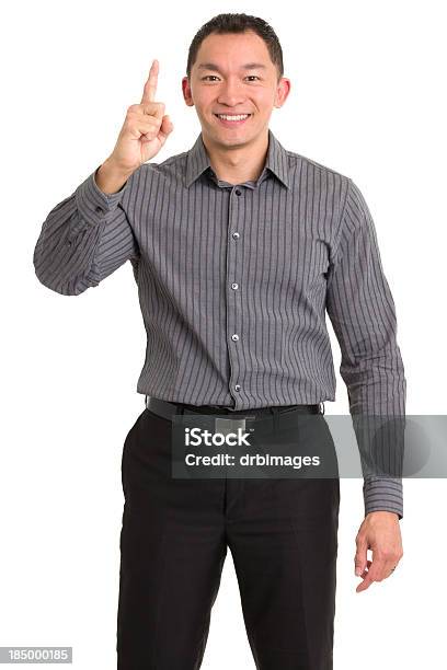 Excited Asian Man Gestures Number One Stock Photo - Download Image Now - Number 1, Number One Finger Sign, Finger
