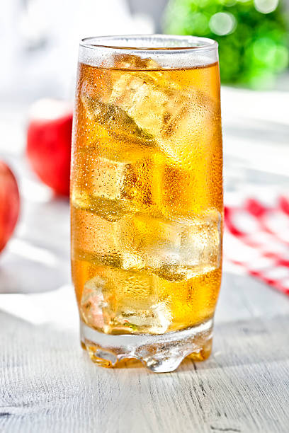 Apple Juice Fresh apple juice whit ice highball glass stock pictures, royalty-free photos & images