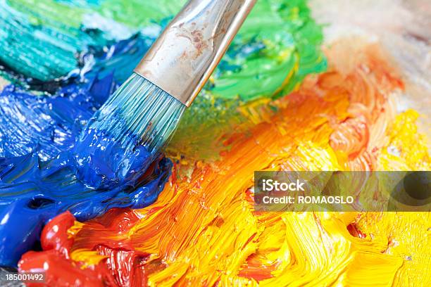 Paintbrush With Oil Paint On A Classical Palette Stock Photo - Download Image Now - Artist's Palette, Paint, Mixing