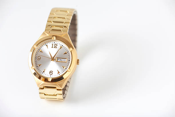 orologio in oro - gold watch foto e immagini stock