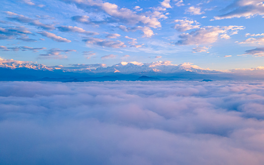 Drone view of cloud and mountain range during winter season in Nepal.