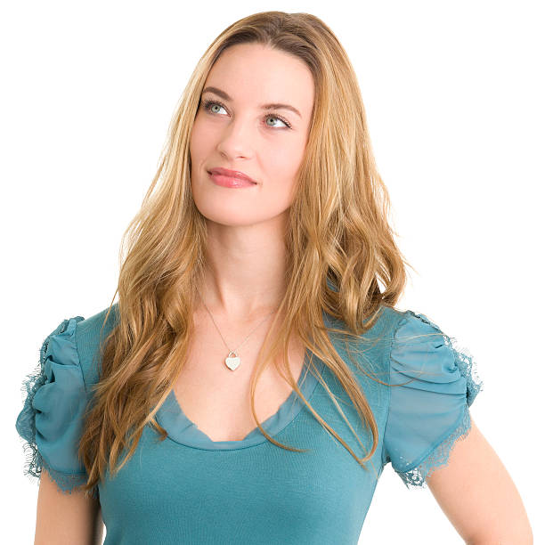 istock Daydreaming Woman Looks Up 185001790