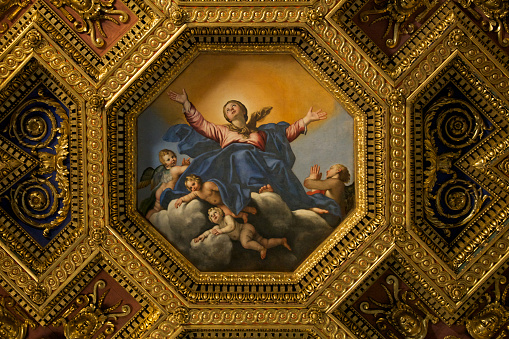 Domenichino's octagonal ceiling painting, Assumption of the Virgin (1617) fits in the coffered ceiling, Church of Santa Maria in Trastevere. Rome, Italy.\u2028http://www.massimomerlini.it/is/rome.jpg\u2028http://www.massimomerlini.it/is/romebynight.jpg\u2028http://www.massimomerlini.it/is/vatican.jpg