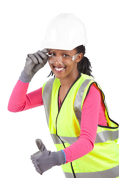 istock Female construction worker wearing safety clothing with a thumb up. 185002590