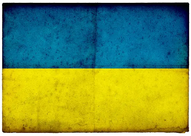 Photo of Grunge Ukraine Flag on rough edged old postcard