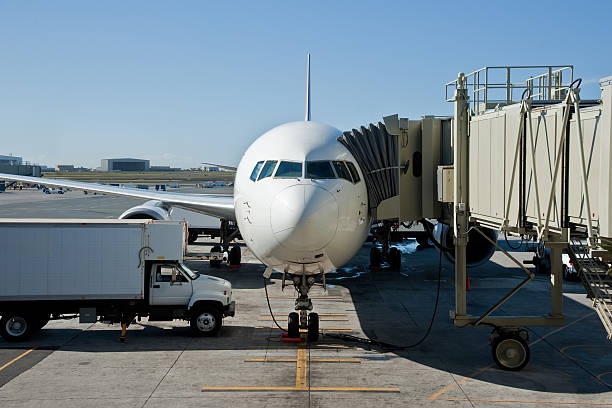 istock Airplane Parked at Airport Gate 185002897