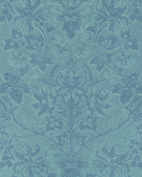 istock textured paper with antique ornament 185003143