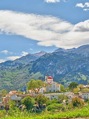 A farmer-centered village in Crete with a church in the middle. Landscape photo of the beautiful island of Crete - the biggest island in Greece.