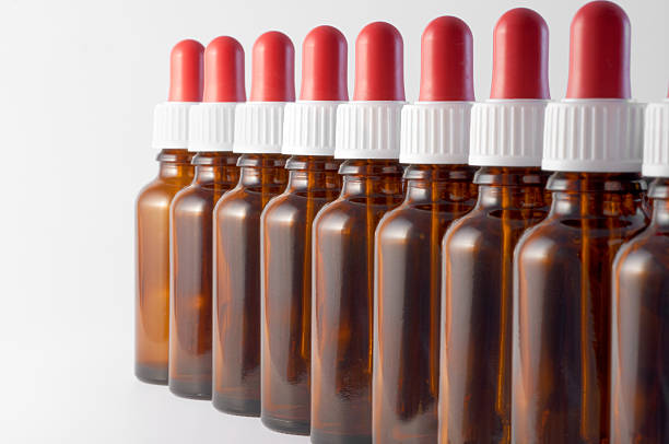 istock brown glas bottles for medicine with dropper 185003409