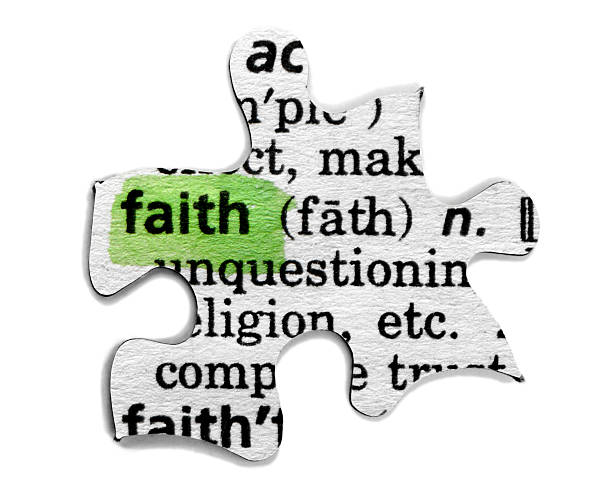 Faith Definition of faith on a puzzle piece. Image could represent that faith is often the most important piece or missing piece. religion god stock pictures, royalty-free photos & images