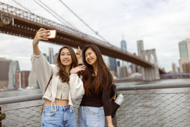 istock Chinese girls exploring NYC 1850036379