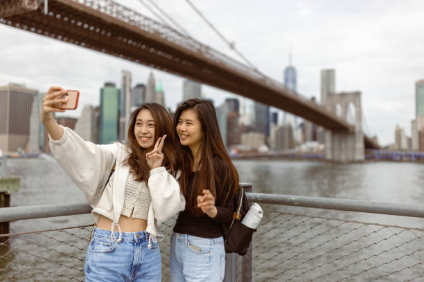 istock Chinese girls exploring NYC 1850037414