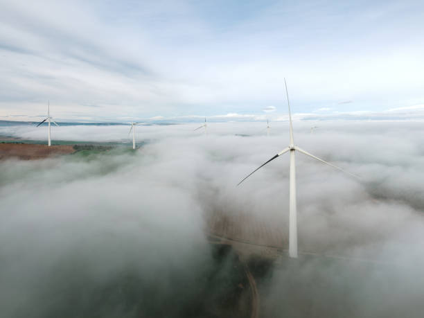 istock Wind turnines over fog 1850037415
