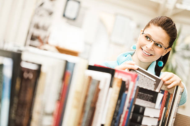 istock Student girl at the library 185004381