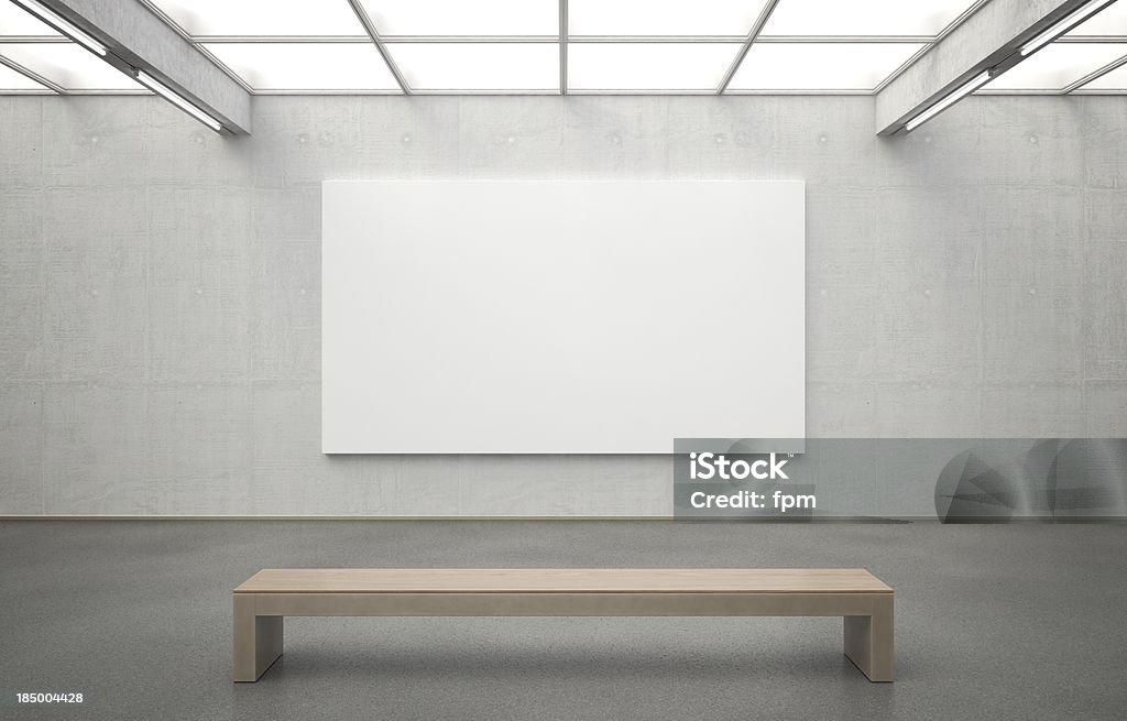 Museum with Image Royalty-free image of a modern museum with an empty canvas for you to fill. The room features clear architecture and smooth lighting. The used materials are highly detailed and accurately constructed. Zoom in to see the pores in the concrete or the individual stones embedded in the asphalt floor. Art Museum Stock Photo