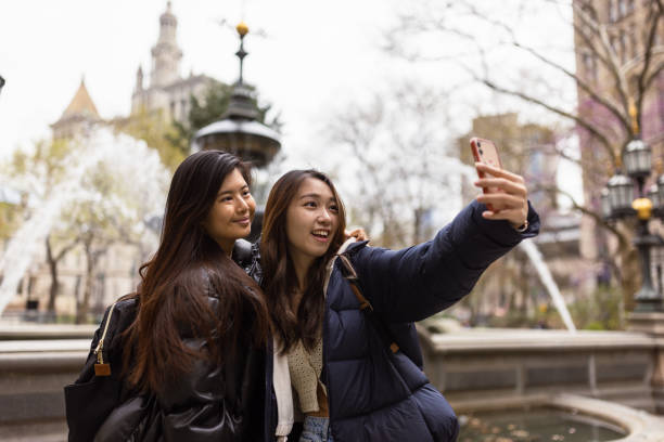 istock Chinese girls exploring NYC 1850050796