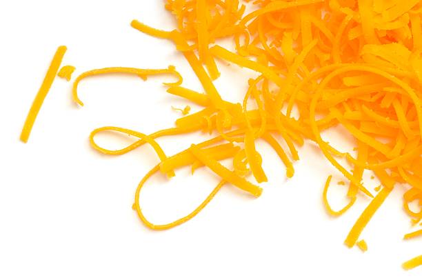 grated red leicester cheese scattered - leicester 個照片及圖片檔
