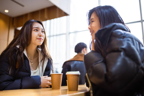 istock Asian tourist taking a coffee break in local cafe 1850053960