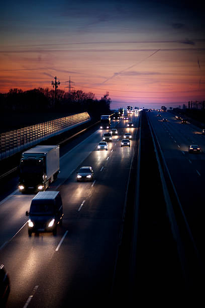 istock Autobahn - view from a bridge at dusk 185005413