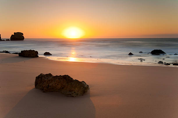 istock Beautiful Algarve beach at sunrise 185005419