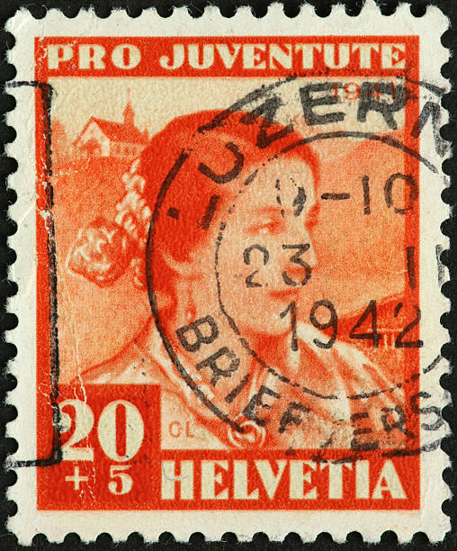 istock woman on an old Swiss postage stamp 185006354