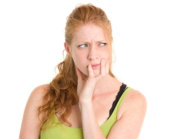 istock Contemplative Young Woman 185006539