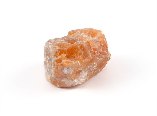 istock Orange calcite - half precious stone. guaranteed authentic 185006602