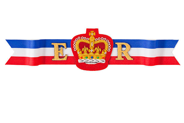Royal Ribbon "The embroidered Crown badge and the colours of the Union Flag, in red white and blue.  Queen Elizabeth II, ER (Elizabeth Regina) will have reigned over the United Kingdom. along with the British Commonwealth, for 60 years from February 6th 1952 to February 6th 2012. Good copy space. Isolated on a white background" elizabeth ii photos stock pictures, royalty-free photos & images