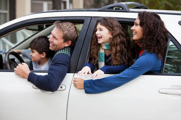 istock Family with two children in car 185006708