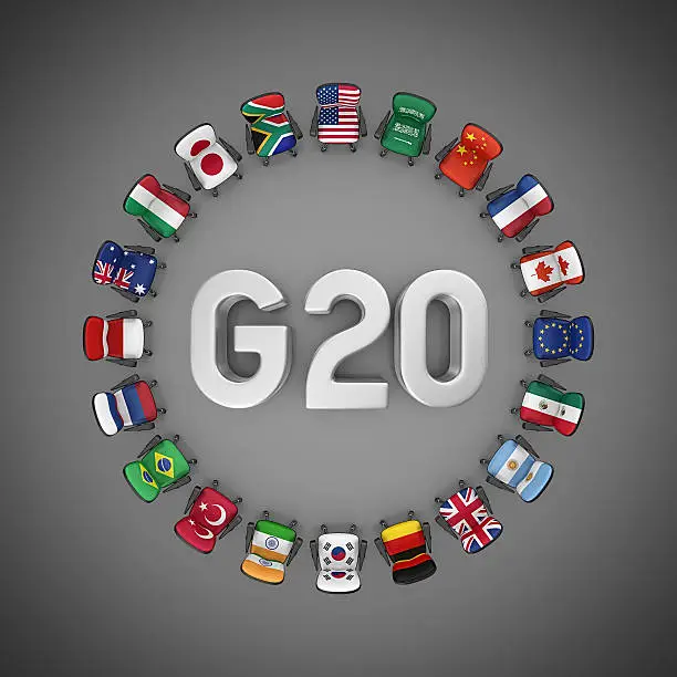 twenty office chairs with flags of g20 countries and g20 in the center.3d render.