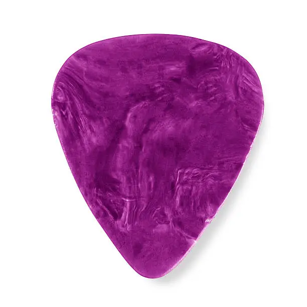 "Photo of a purple, patterned, plastic guitar pick/plectrum showing signs of use"