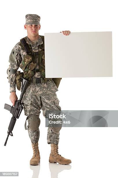 Army Soldier Holding A Placard Stock Photo - Download Image Now - Armed Forces, Army Soldier, Holding