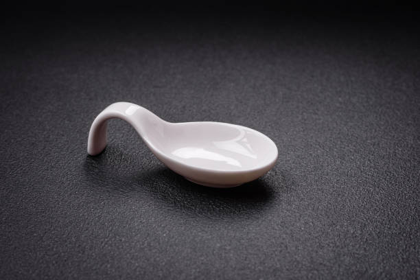 istock Beautiful empty white ceramic gravy boat on a textured concrete background 1850073005