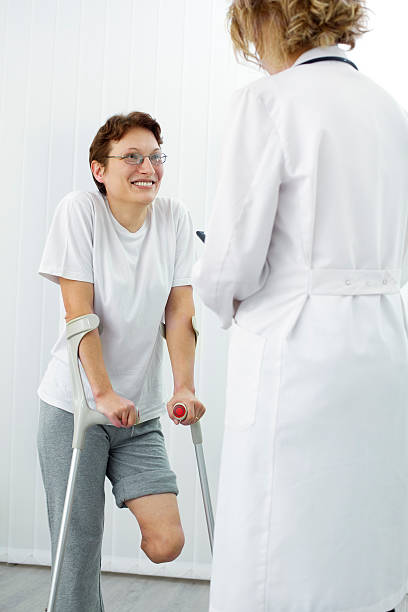 istock Woman with Artificial Limb at doctors office 185007734