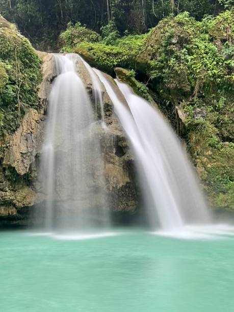 istock Blue flowing water under Kawasan falls in Cebu, Philippines 1850078035