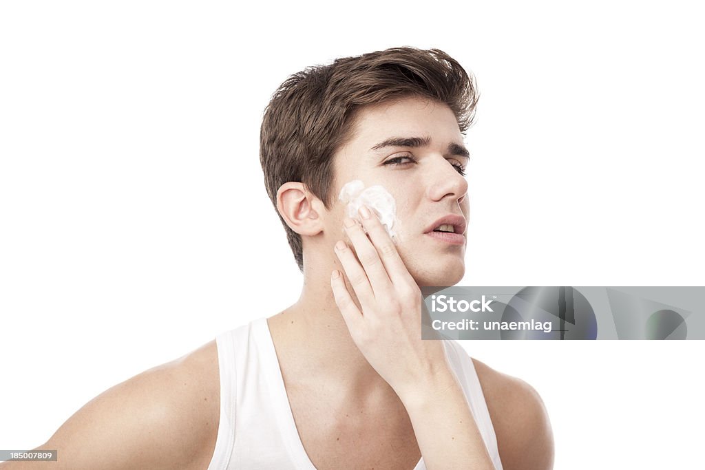 Mann mit Gesichtsbehandlung Creme mit Frau helfen - Lizenzfrei Alternative Behandlungsmethode Stock-Foto