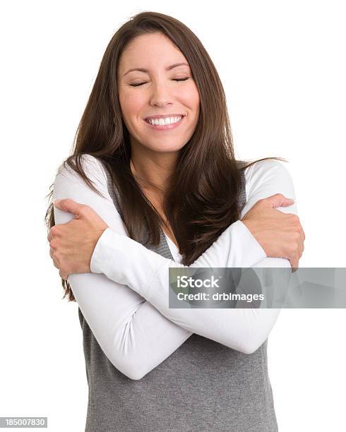 Happy Woman Hugging Herself Stock Photo - Download Image Now - 20-24 Years, 20-29 Years, 25-29 Years