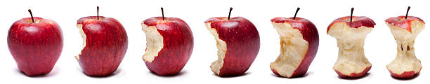 Stages of eating red apple Stages of eating red apple apple with bite out stock pictures, royalty-free photos & images