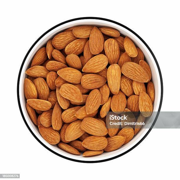 Almonds In A Bowl From Directly Above Stock Photo - Download Image Now - Almond, Cut Out, Black Color