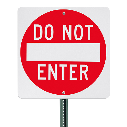 A DO NOT ENTER sign post over a white background - clipping path included