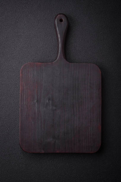 istock Empty wooden cutting board for preparing ingredients for preparing a delicious dish 1850085037