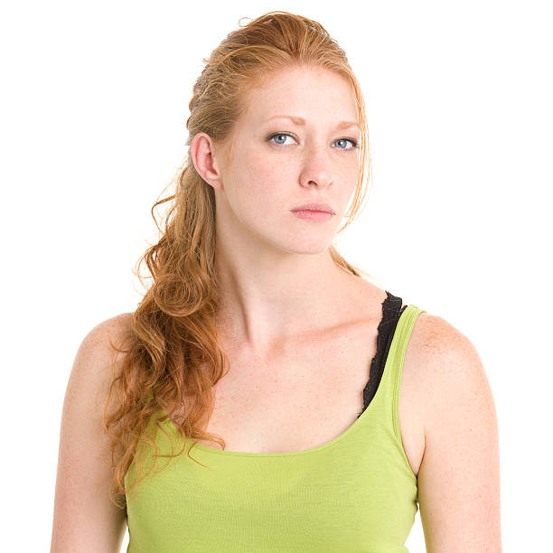istock Serious Young Woman Staring at Camera 185008518