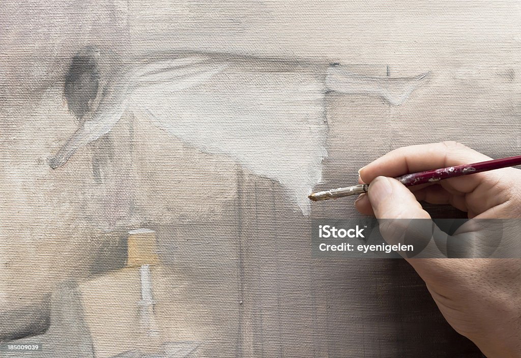 Artist An artist is finishing his oil painting Painting - Art Product Stock Photo