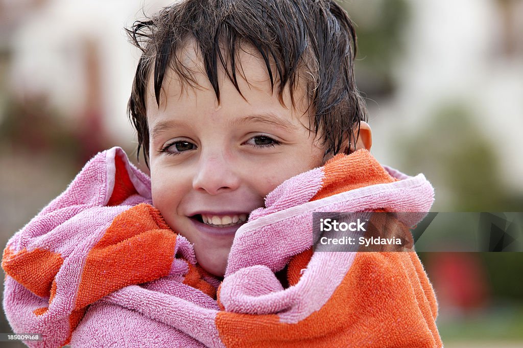 Drying off "Child with the wet hair, drying off with a towel" Child Stock Photo