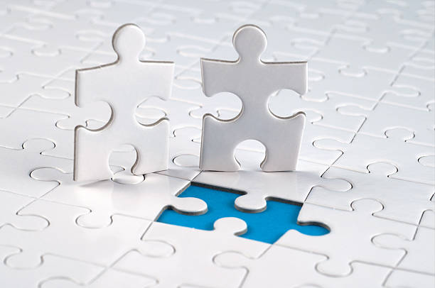 istock finishing the jigsaw, but wich is right? 185009601